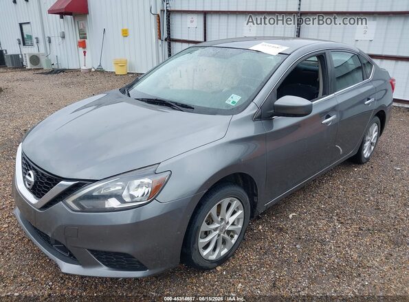 3N1AB7AP7KY285908 2019 NISSAN SENTRA Gray Vista tres cuartos delantera izquierda
