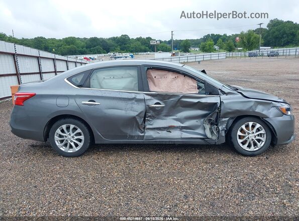 3N1AB7AP7KY285908 2019 NISSAN SENTRA Gray Vista interior trasera