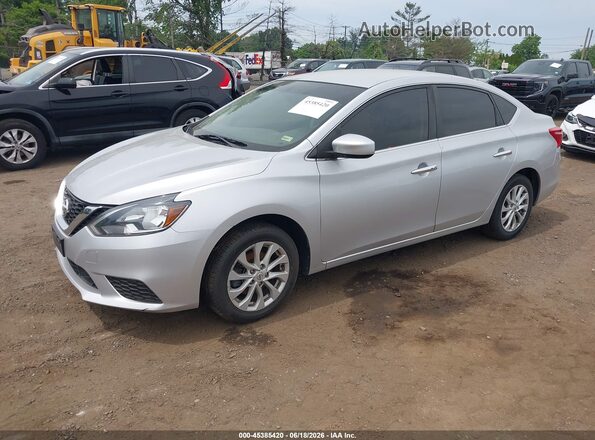 3N1AB7AP7KY313447 2019 NISSAN SENTRA Серебряный Передняя левая четверть