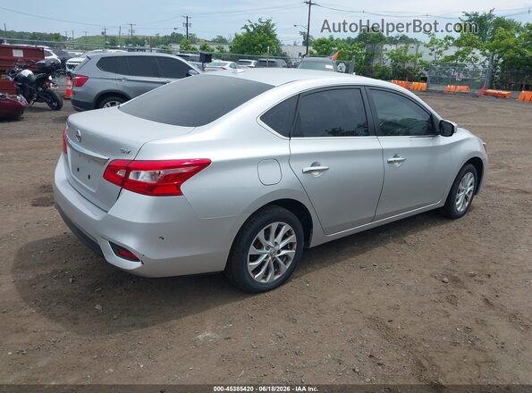 3N1AB7AP7KY313447 2019 NISSAN SENTRA Серебряный Задняя правая четверть