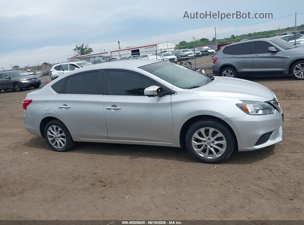3N1AB7AP7KY313447 2019 NISSAN SENTRA Серебряный Вид задней части салона