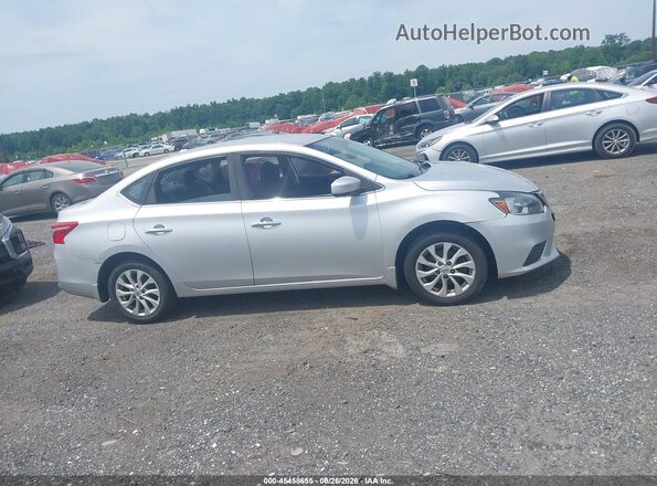 3N1AB7AP7KY422717 2019 NISSAN SENTRA Silver Rear interior view