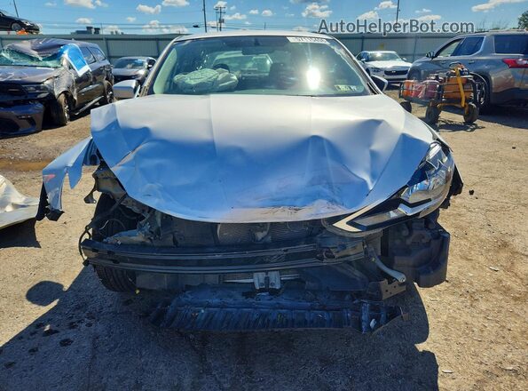3N1AB7AP8HY351021 2017 NISSAN SENTRA Silver Widok z przodu