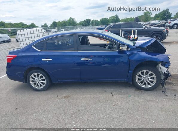 3N1AB7AP8JY220239 2018 NISSAN SENTRA Blue Rear interior view