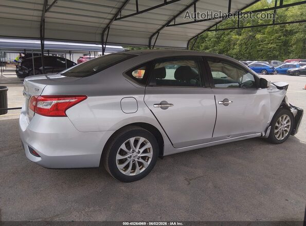 3N1AB7AP8KY366691 2019 NISSAN SENTRA Silver Вид задньої частини салону