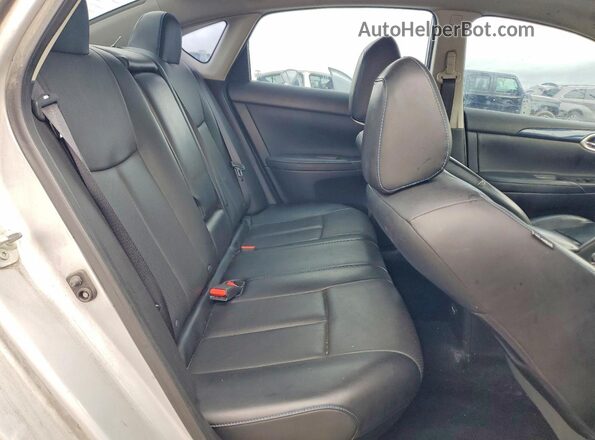 3N1AB7AP9JY250883 2018 NISSAN SENTRA Silver Rear seats view