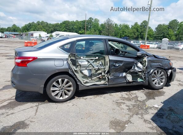 3N1AB7AP9JY254576 2018 NISSAN SENTRA Gray Rear interior view