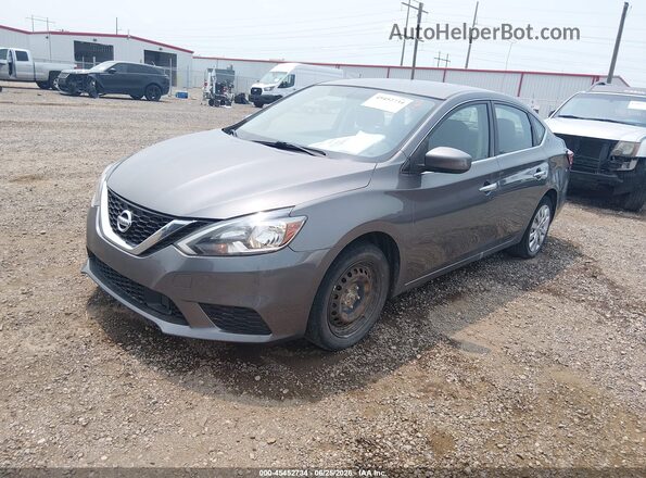 3N1AB7AP9JY331396 2018 NISSAN SENTRA Gray Vista tres cuartos delantera izquierda
