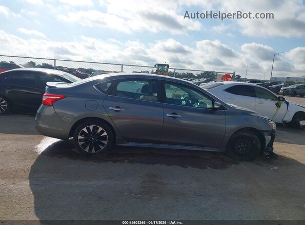 3N1AB7AP9KY302630 2019 NISSAN SENTRA Gray Вид задньої частини салону