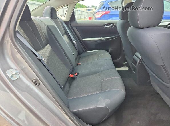 3N1AB7APXGY330332 2016 NISSAN SENTRA Silver Widok tylnych siedzeń