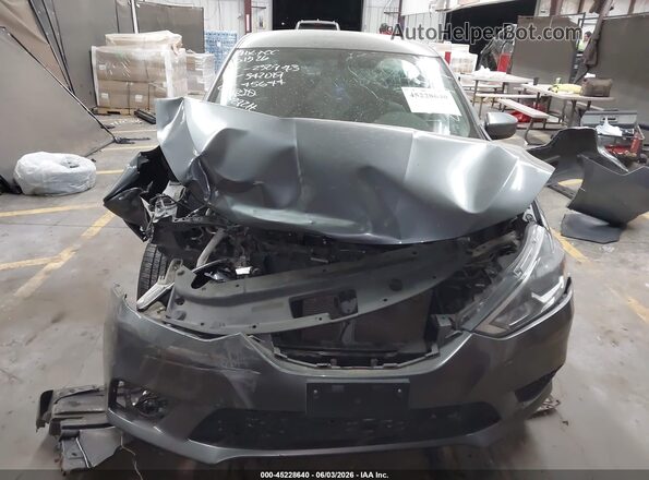 3N1AB7APXJY232943 2018 NISSAN SENTRA Gray Widok zestawu wskaźników