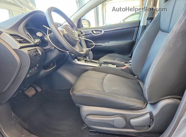 3N1AB7APXJY263500 2018 NISSAN SENTRA Gray Front interior view