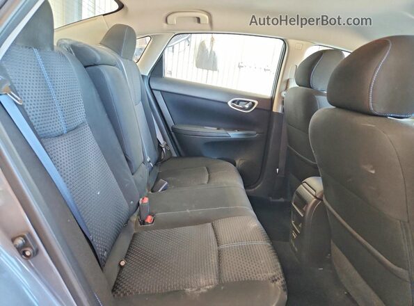 3N1AB7APXJY263500 2018 NISSAN SENTRA Gray Rear seats view