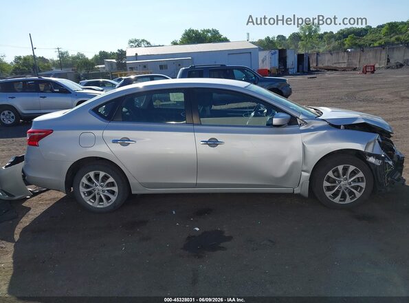 3N1AB7APXKY437860 2019 NISSAN SENTRA Silver Widok wnętrza z tyłu