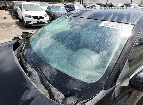 3N1AB8BV0RY312041 2024 NISSAN SENTRA Black Vista de la etiqueta del VIN