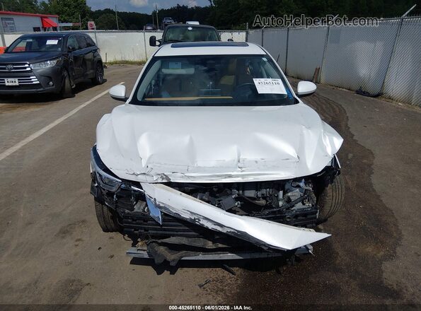 3N1AB8CV2NY256712 2022 NISSAN SENTRA Белый Вид задней части салона