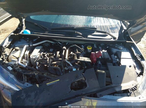 3N1AB8CV8RY286738 2024 NISSAN SENTRA Gray Rear view