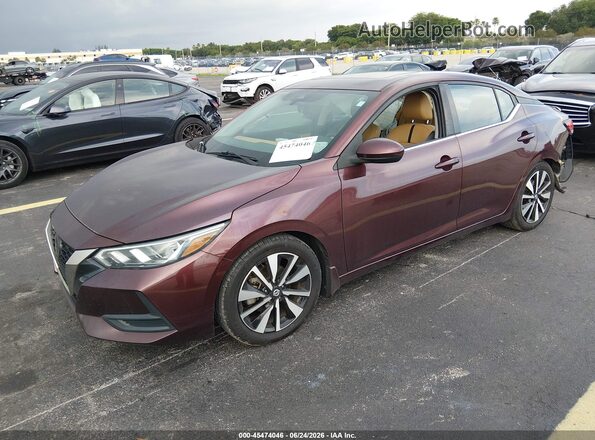 3N1AB8CV9MY294002 2021 NISSAN SENTRA Maroon Vista tres cuartos delantera izquierda