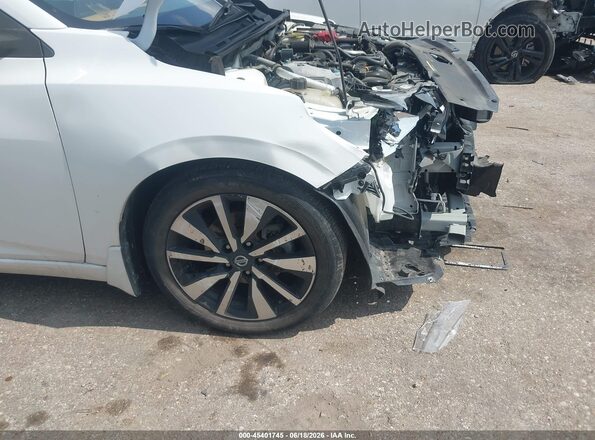 3N1AB8CV9PY247993 2023 NISSAN SENTRA White Front view