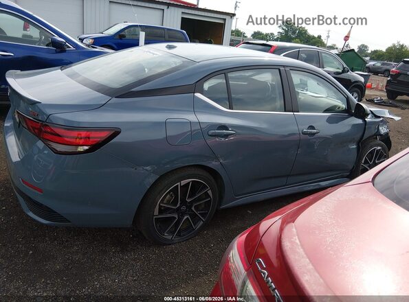 3N1AB8DV1SY333774 2025 NISSAN SENTRA Teal Вид задньої частини салону