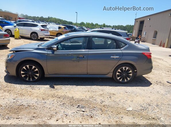 3N1CB7AP3JY214714 2018 NISSAN SENTRA Gray Widok wnętrza z tyłu