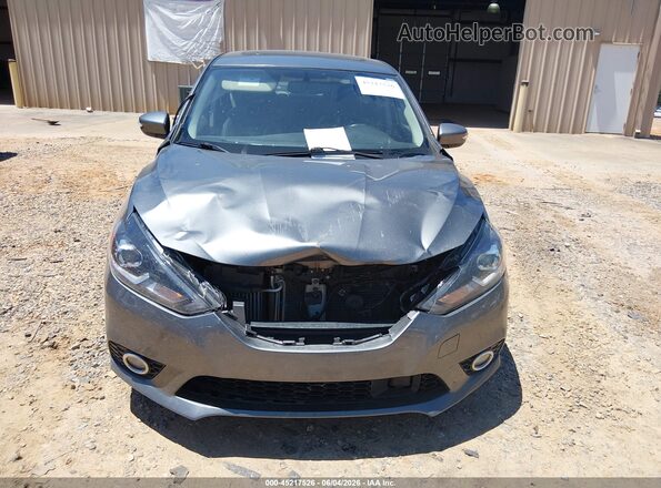 3N1CB7AP3JY214714 2018 NISSAN SENTRA Gray Widok deski rozdzielczej