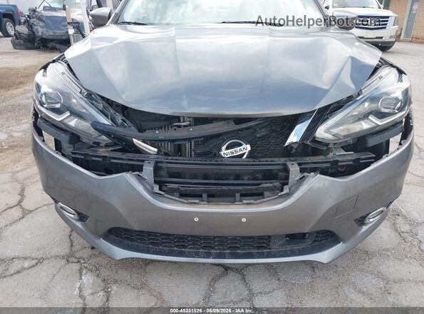 3N1CB7AP5JY203973 2018 NISSAN SENTRA Серый Вид спереди
