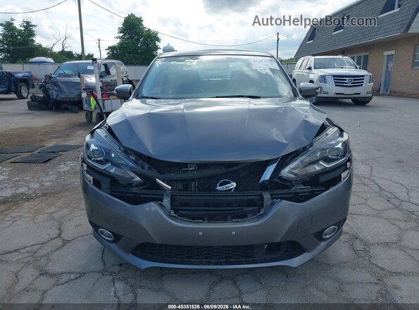 3N1CB7AP5JY203973 2018 NISSAN SENTRA Серый Вид задней части салона