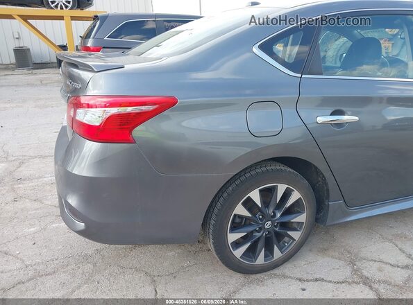 3N1CB7AP5JY203973 2018 NISSAN SENTRA Серый Вид щитка приборов