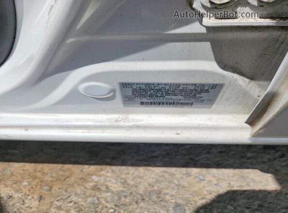 3N1CE2CP0GL394666 2016 NISSAN VERSA White VIN sticker view