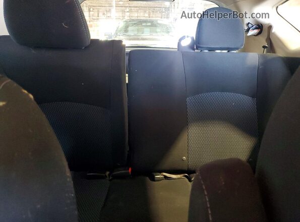 3N1CE2CP1GL381148 2016 NISSAN VERSA Silver Rear seats view