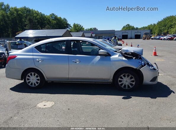 3N1CN7AP2GL835424 2016 NISSAN VERSA Silver Սալոնի հետևի տեսք