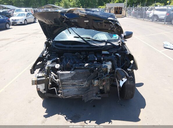 3N1CN7AP4GL872314 2016 NISSAN VERSA Black Vista trasera