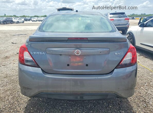 3N1CN7AP6KL867723 2019 NISSAN VERSA Серебряный Вид сзади