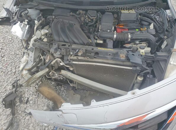3N1CN7AP9GL916808 2016 NISSAN VERSA Silver Սալոնի հետևի տեսք