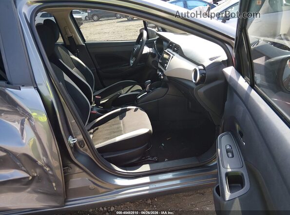3N1CN8EV8ML923159 2021 NISSAN VERSA Серый Вид салона спереди