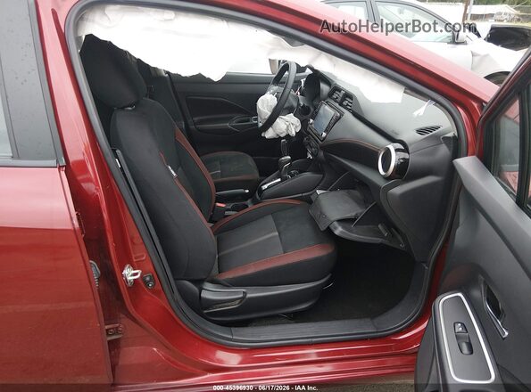 3N1CN8FV9PL831092 2023 NISSAN VERSA Red Вид салону спереду