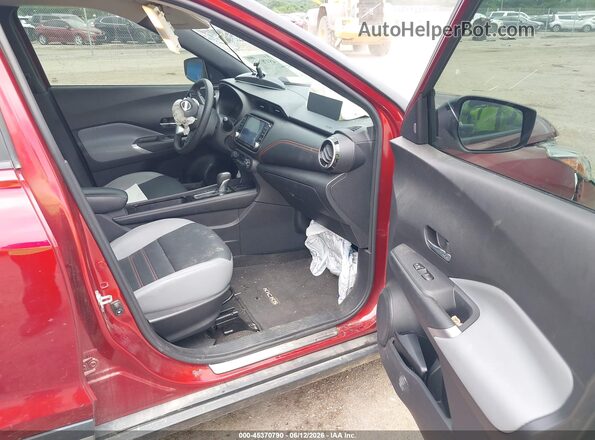 3N1CP5DV2PL470591 2023 NISSAN KICKS Maroon Widok wnętrza z przodu