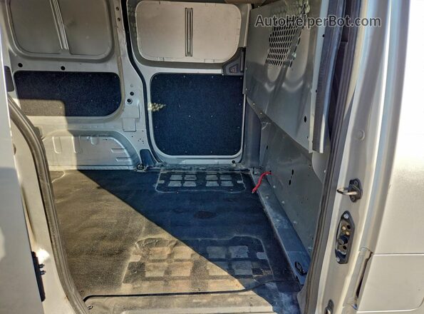 3N6CM0KNXGK697512 2016 NISSAN NV200 Silver Vista interior trasera