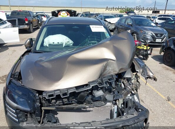 3N8AP6DA4SL429576 2025 NISSAN KICKS Brown Սալոնի հետևի տեսք
