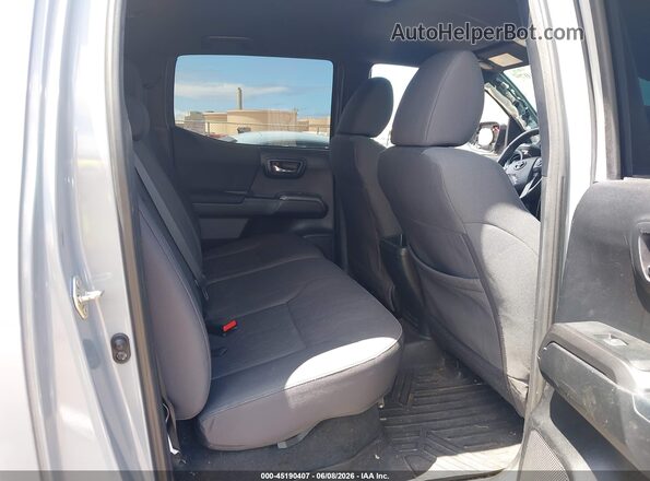 3TMAZ5CN0JM057537 2018 TOYOTA TACOMA Gray Widok naklejki z numerem VIN