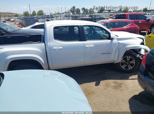 3TMAZ5CN0JM065461 2018 TOYOTA TACOMA White Սալոնի հետևի տեսք