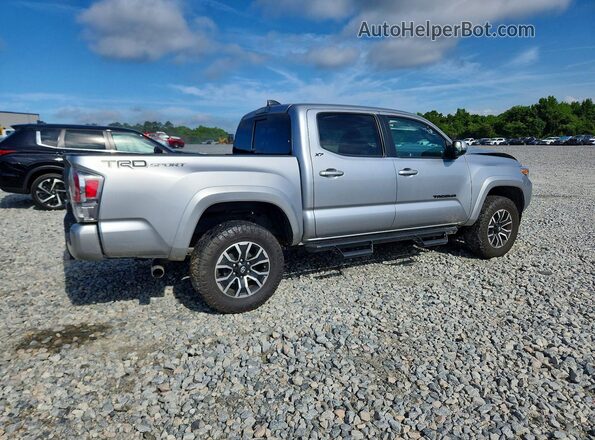 3TMAZ5CN0PM217280 2023 TOYOTA TACOMA Silver Հետևի աջ
