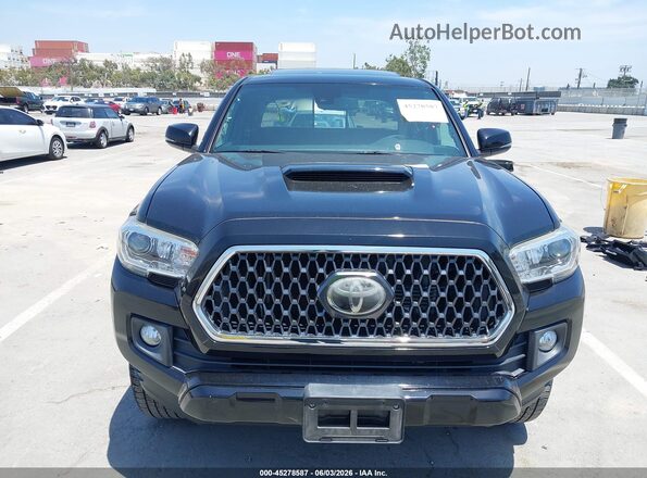 3TMAZ5CN2KM112622 2019 TOYOTA TACOMA Black Widok wnętrza z tyłu