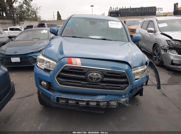 3TMAZ5CN4KM096018 2019 TOYOTA TACOMA Синий Вид задней части салона