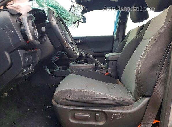 3TMAZ5CN5MM147142 2021 TOYOTA TACOMA Silver Widok wnętrza z przodu