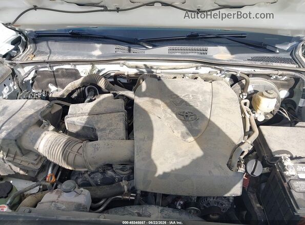 3TMAZ5CN6KM078975 2019 TOYOTA TACOMA White Հետևի տեսք