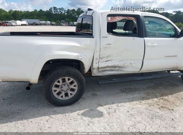 3TMAZ5CN6KM078975 2019 TOYOTA TACOMA White Դիմացի տեսք