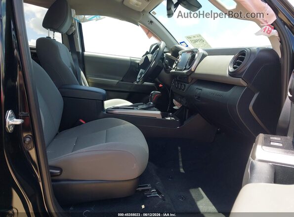 3TMAZ5CN7PM218698 2023 TOYOTA TACOMA Black Вид салону спереду