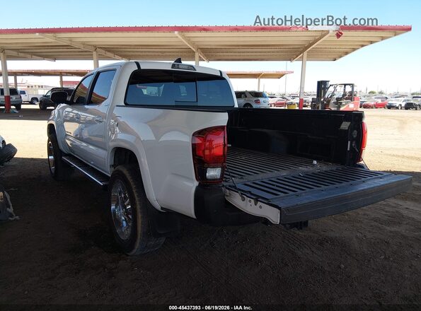 3TMAZ5CN8JM060525 2018 TOYOTA TACOMA White Trasero izquierdo